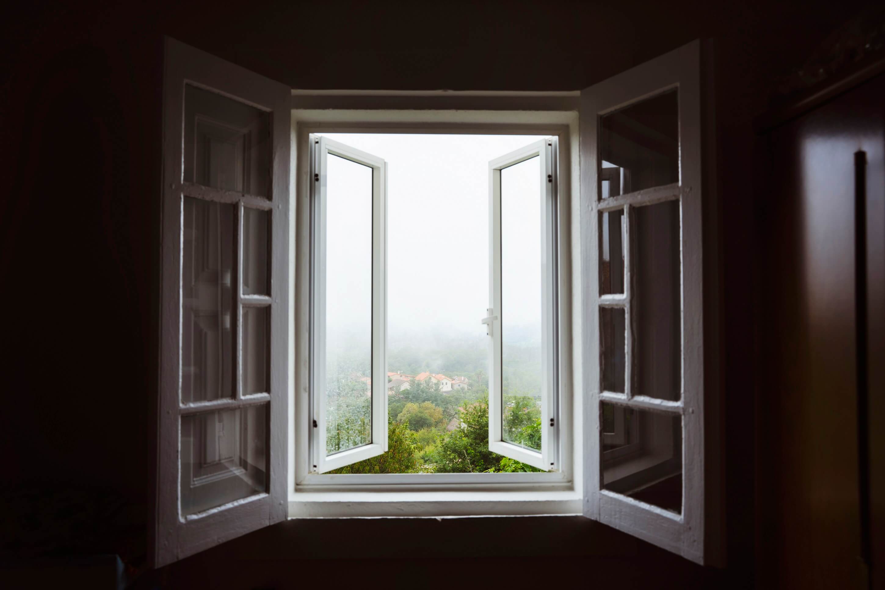 wide-open-window-with-amazing-countryside-view-foggy-day-stay-home-concept-scenery-view-from-house-travel-spain-holidays-concept-open-window-air-room-ventilate-your-house